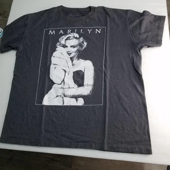 У Фернанденона была выцветшая футболка с изображением Мэрилин Монро