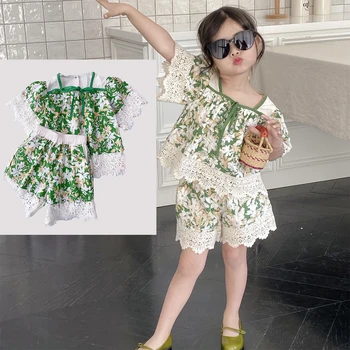 2023 Новый Baby Girl Kid Сладкая зеленая одежда Детский набор Цветочный кружевной рубашка Кружевные шорты Два предмета Повседневная мода с коротким рукавом Костюм